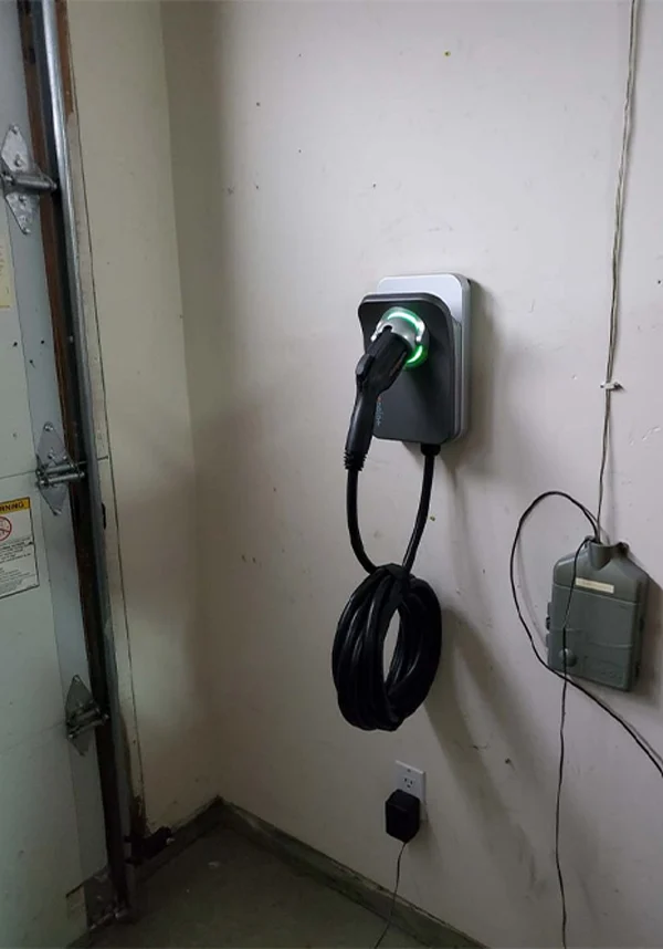 EV charger mounted on a garage wall